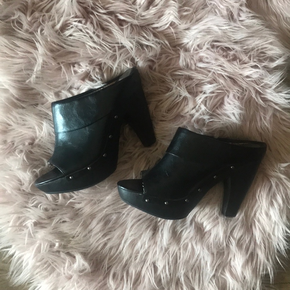 Black high heeled slip on mules